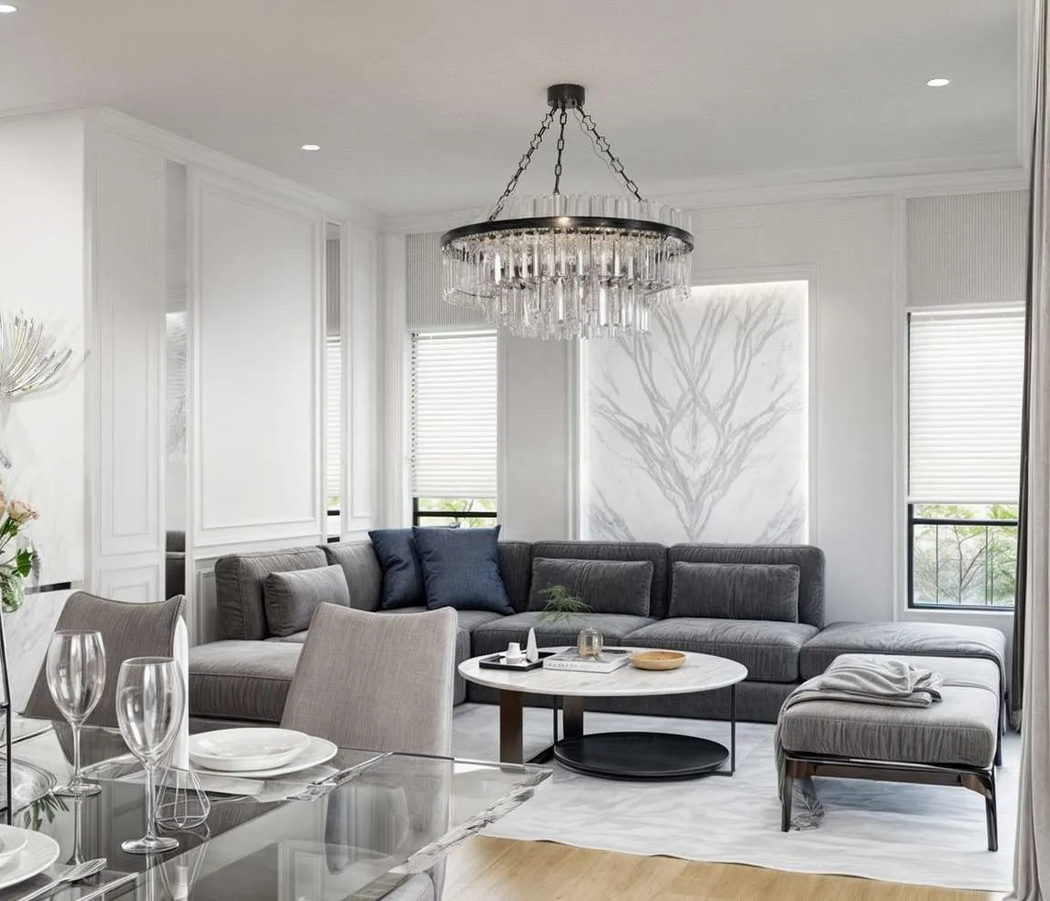 3D visualization of a living and dining room with a crystal chandelier, grey sectional sofa and marble tables